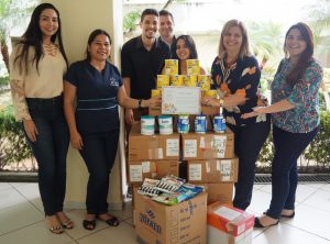 Imagem da notícia - PGE-AM entrega doação de leite em pó à Casa Vhida